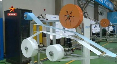 중국 AVIC가 개발한 전자동 마스크 기계. 사진=CCTV 방송 캡처